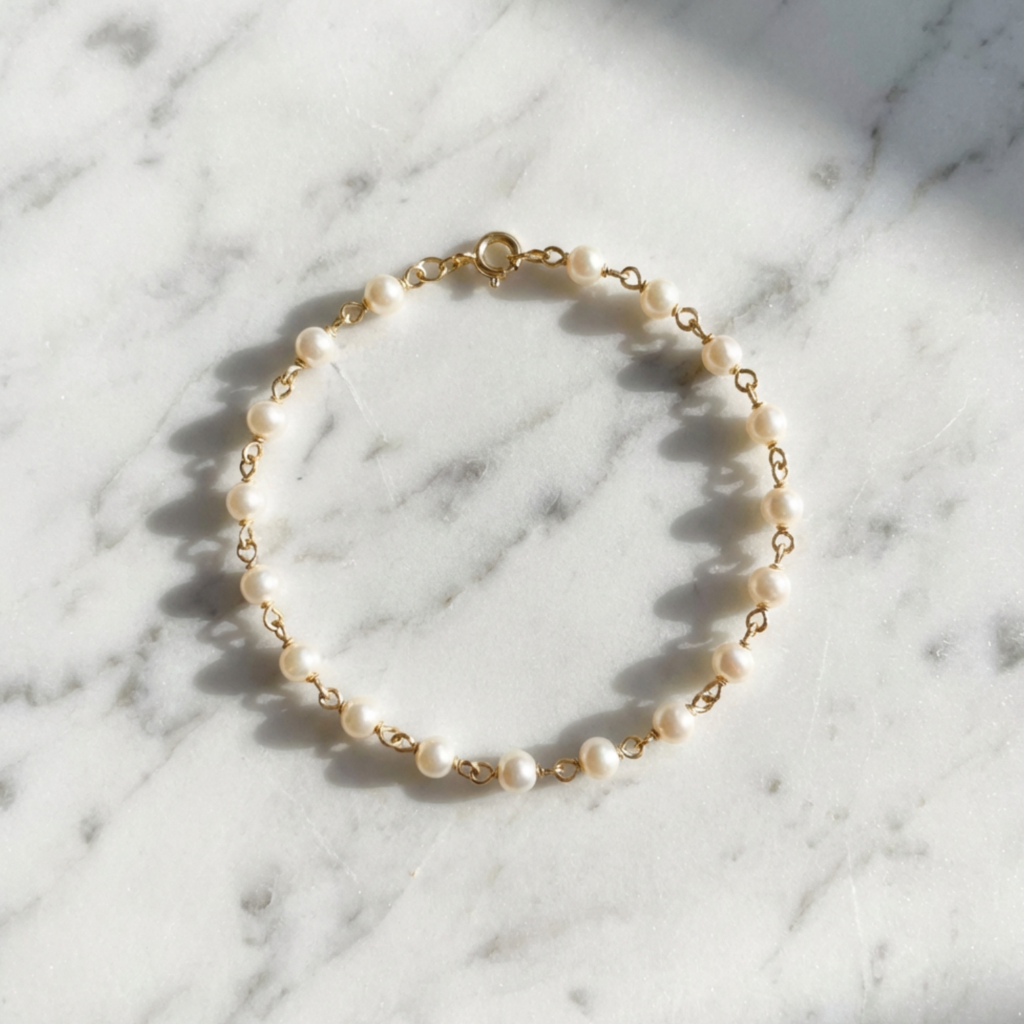 Home vritha brass pearl gold plated bracelet